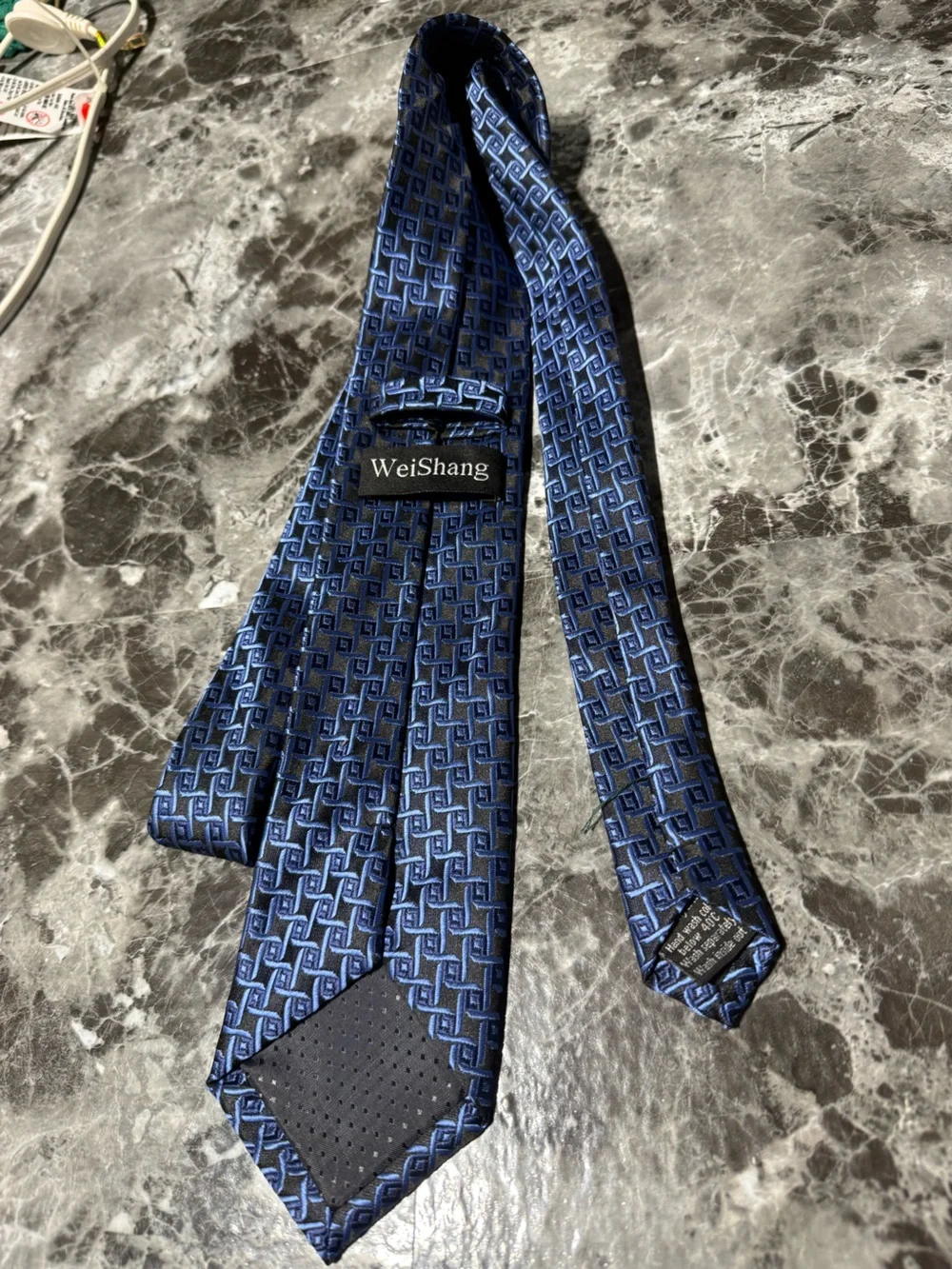 Men’s WeiShang tie in purple/blue/black geometric print